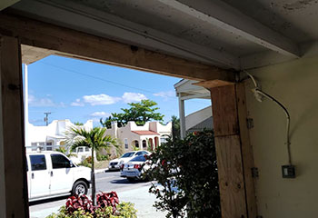 Garage door opening prepped for new installation in Coppell home garage